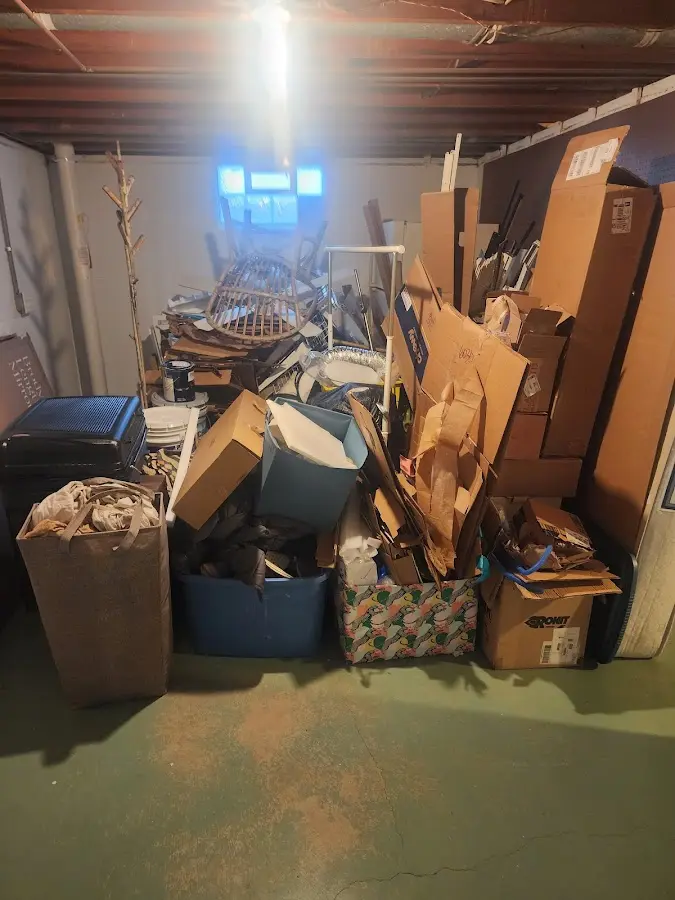 Roll-off dumpster container at job site for Cleanout Dumpster Rental in Seven Lakes